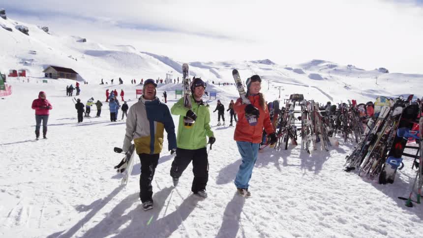 A crowd of people at a ski resort