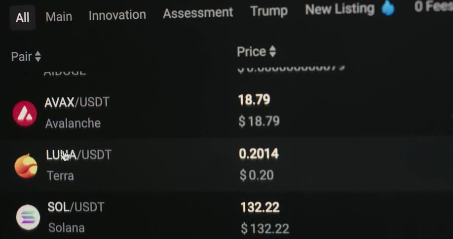 Cryptocurrency prices are displayed on the screen