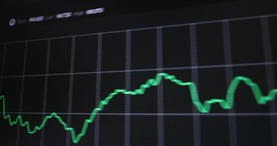 The screen has a graph for cryptocurrency