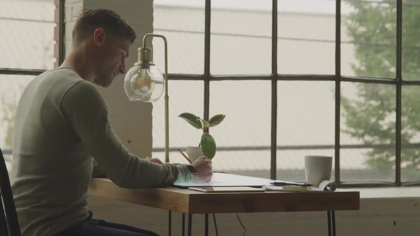 A man is working in the office