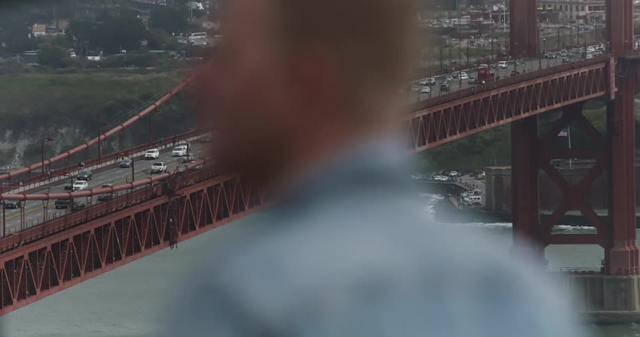 A man stands with a view of a bride ahead