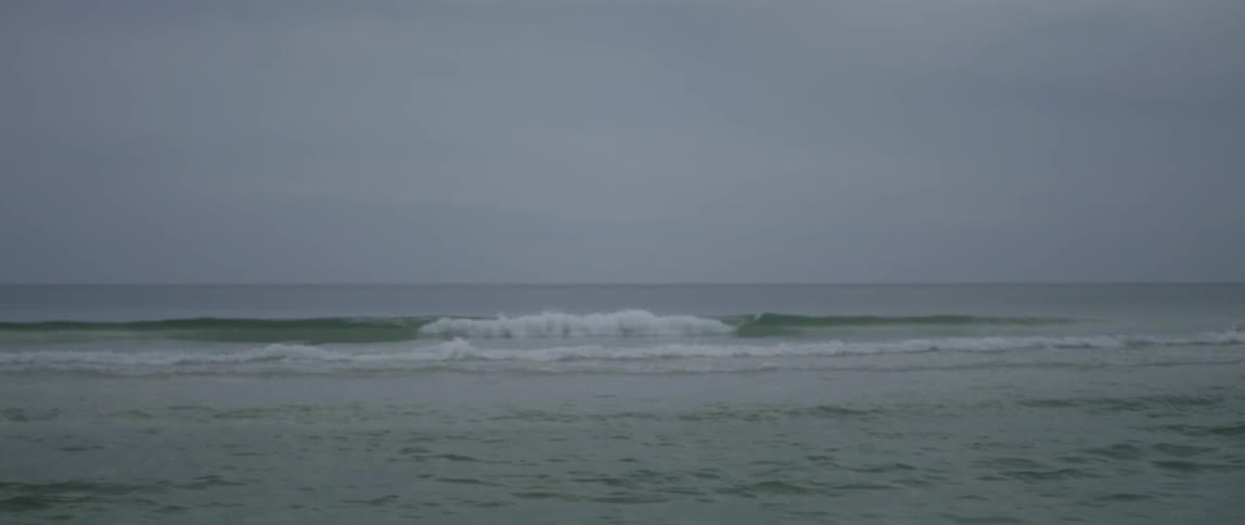 Small waves formed by the tide coming in