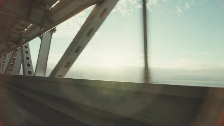 A bridge runs along the shore line