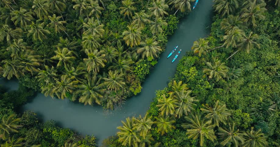 An aerial footage of a boats in the river