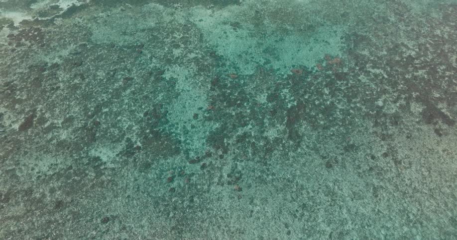 Blue waters are on the beach