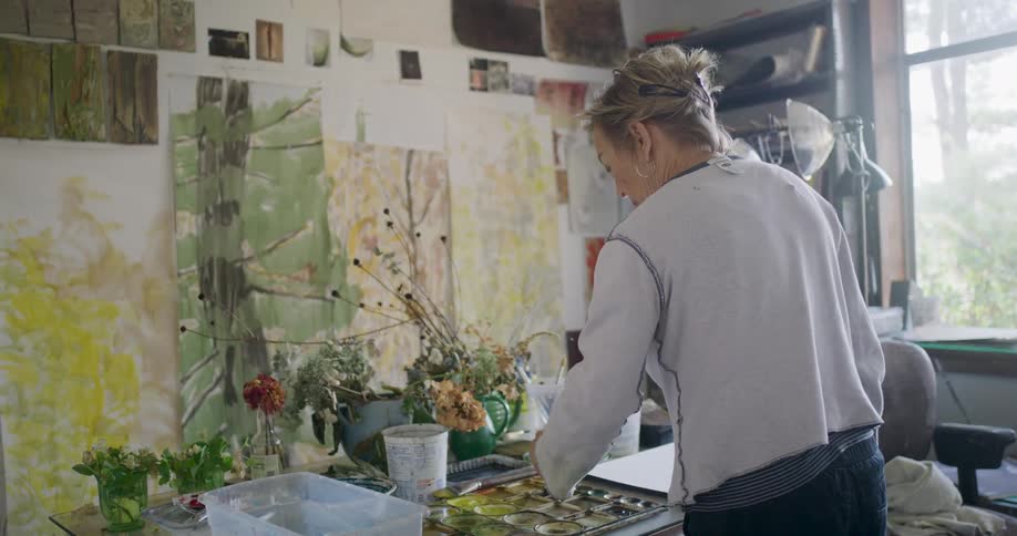 Lady painting in her studio