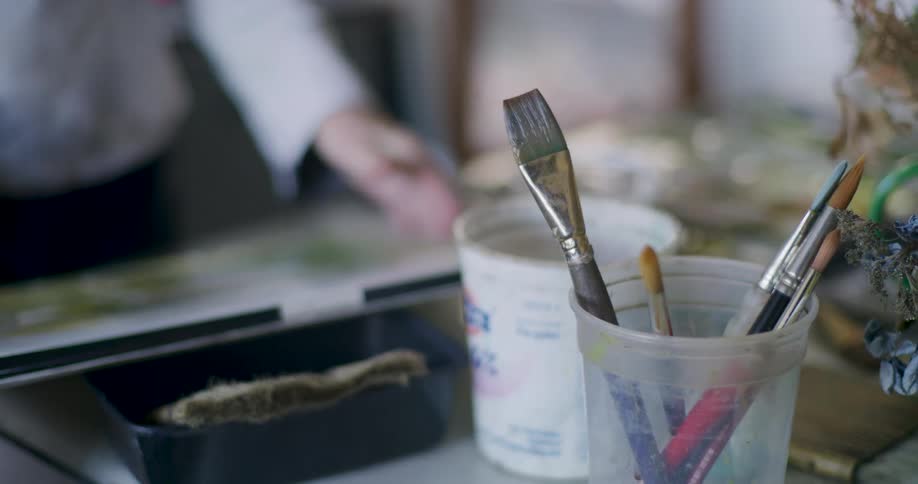 Artist who paints a picture