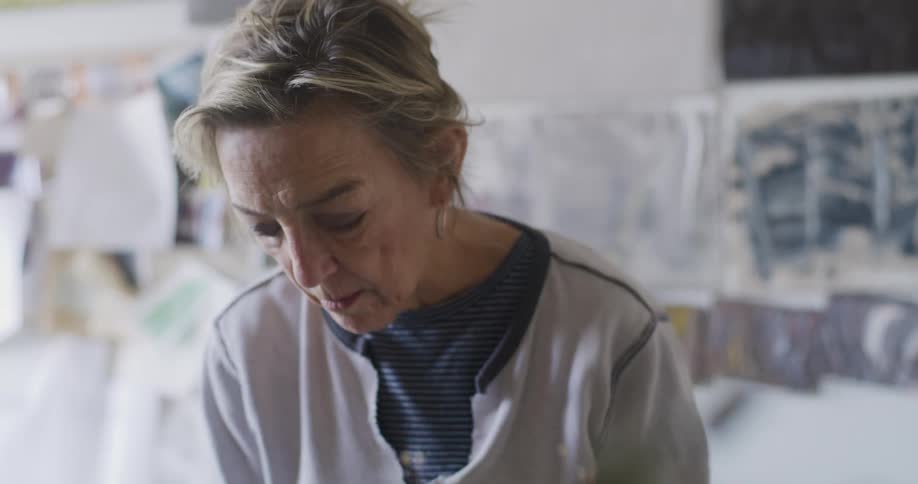Female designer works in her workshop