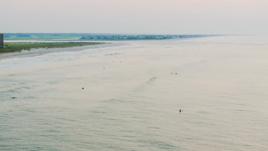 A hotel is on the shore of the island