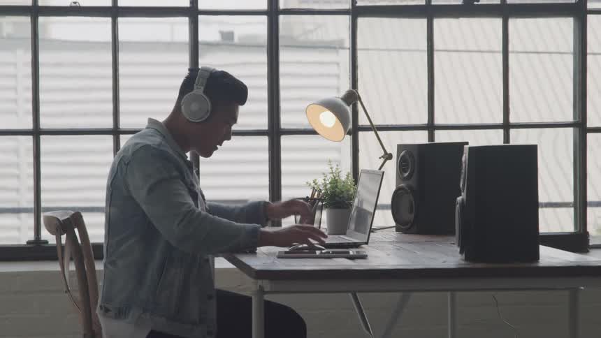 A footage of an asian man in the office