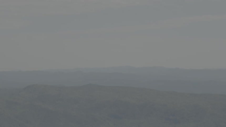 Fog and mist is covering the top of the mountains