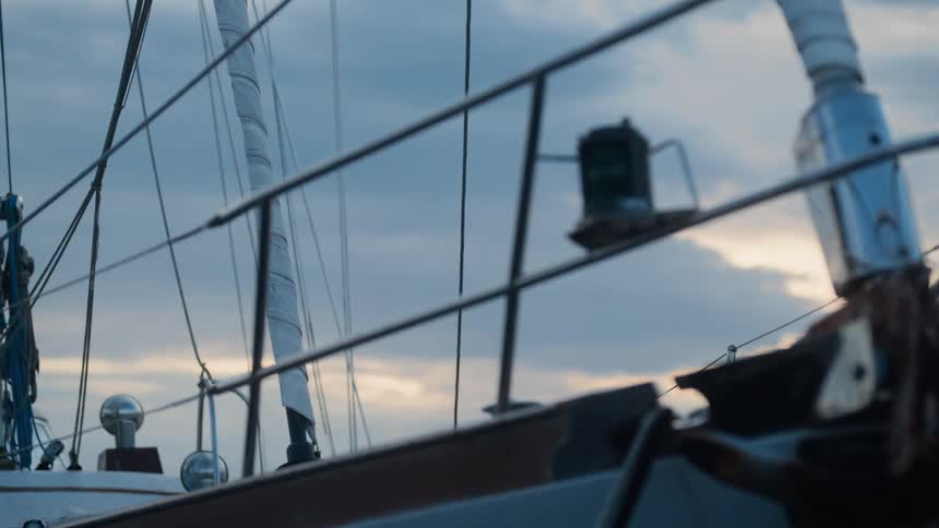 Static ship in a cloudy dawn