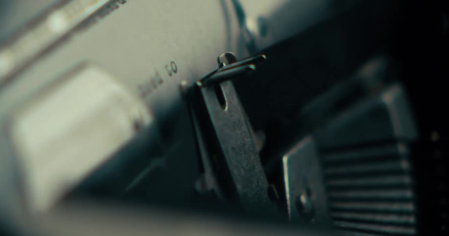 The ribbon on the typewriter is moving