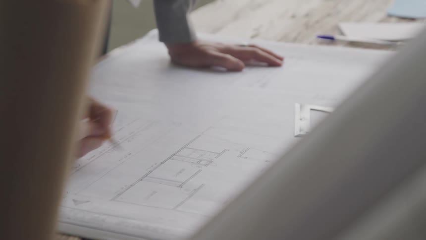 A footage of a man working on a document