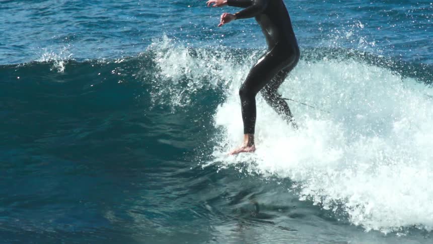 Surfer riding a wave