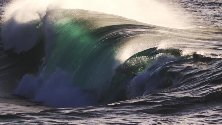 Wave formation in slow motion then crashing in the ocean