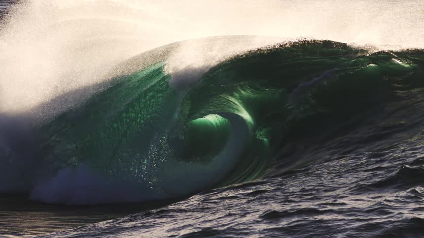 Very slow motion wave formation crashing in the ocean