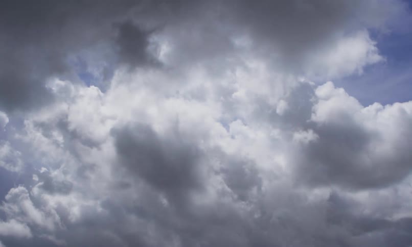 Storm clouds form in the sky