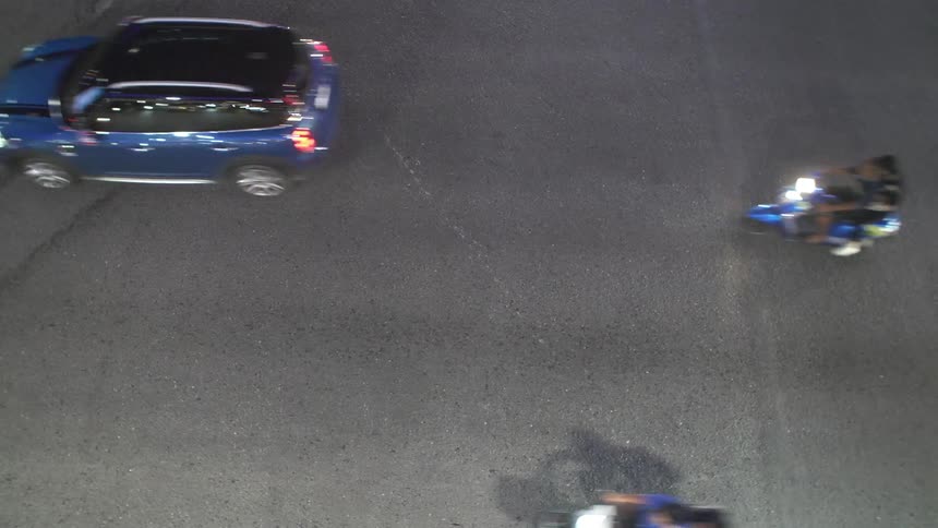 A bus and cars travel in traffic