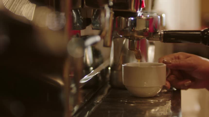 A footage of a person serving a coffee