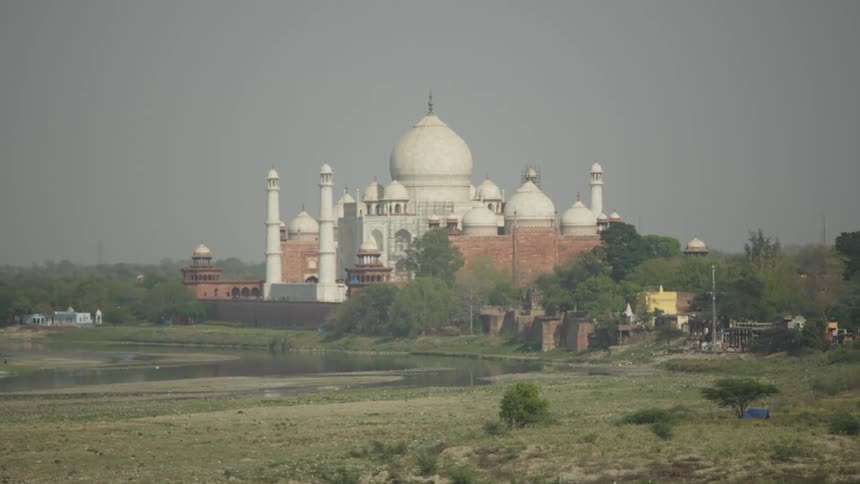 The Taj Mahal is in the distance