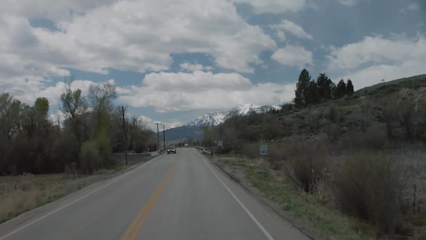 Driving down the road during the day