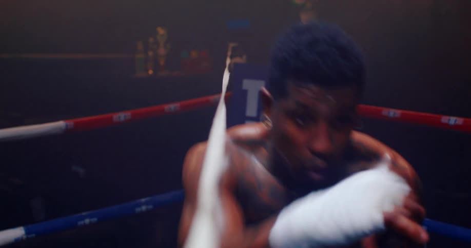 Boy boxing training very sweaty