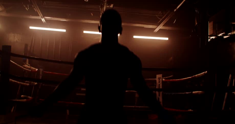 A man is jumping rope by the boxing ring