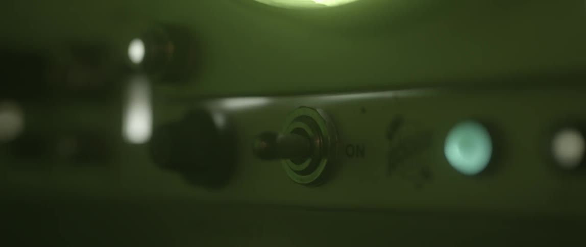 A person flips the switch