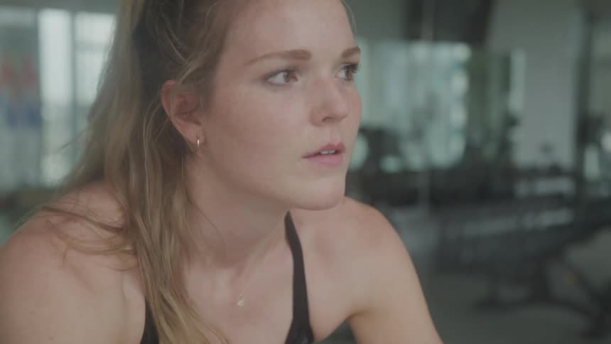 Girl pedaling on an exercise bike