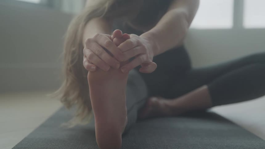 A clip of a lady stretching