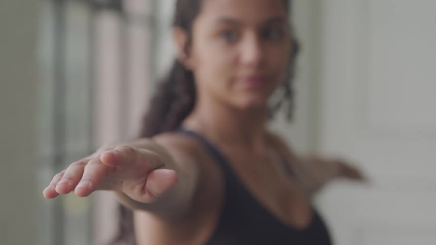 A woman is doing yoga