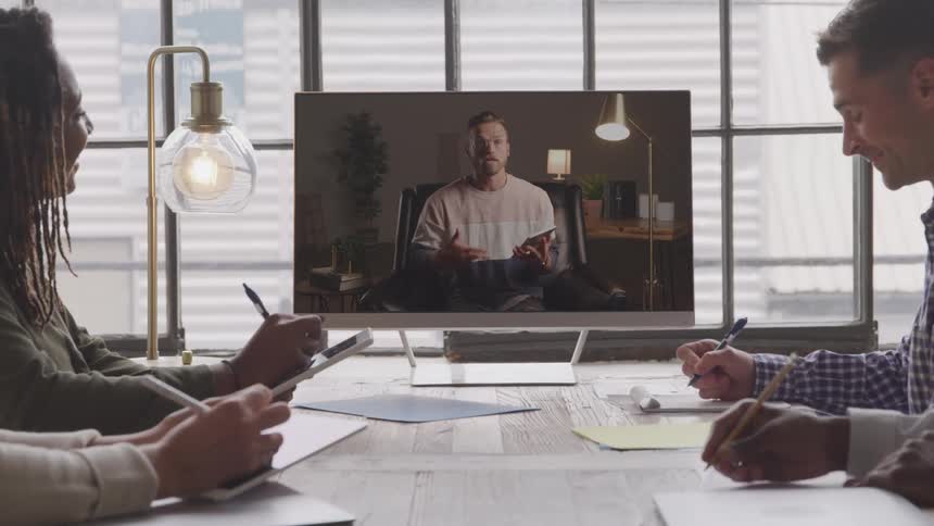A footage of people having a live meeting