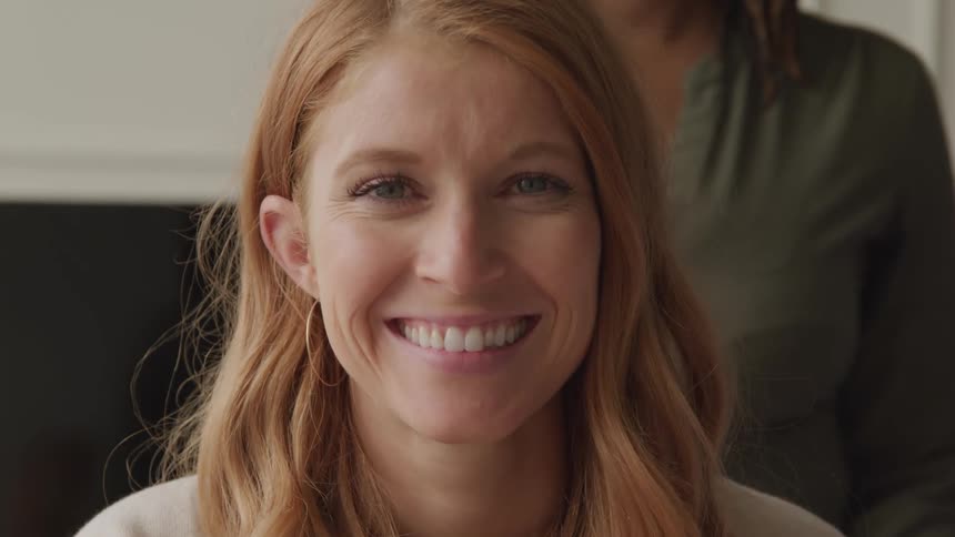 A footage of a lady smiling