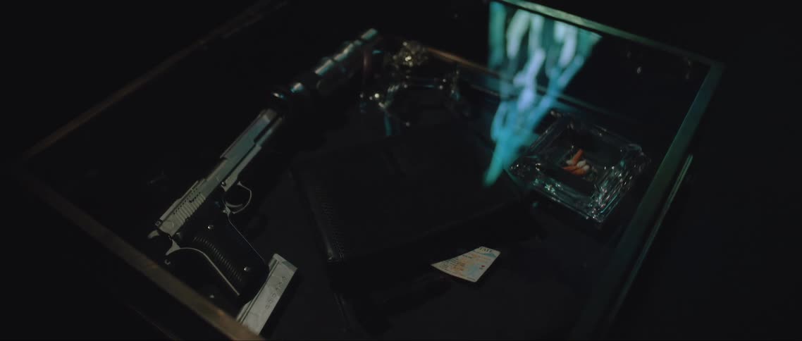 A footage of a gun in a case