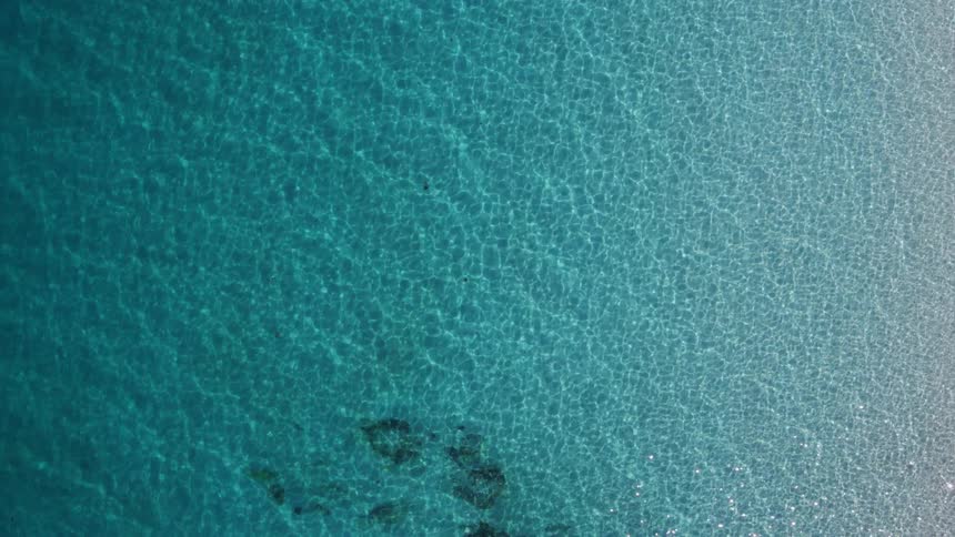 An aerial footage of the blue sea