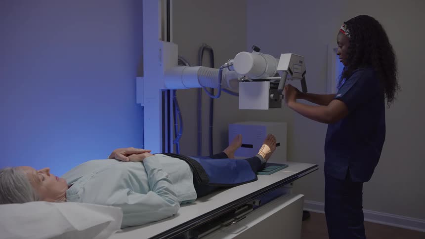 A footage of a doctor operating a medical machine