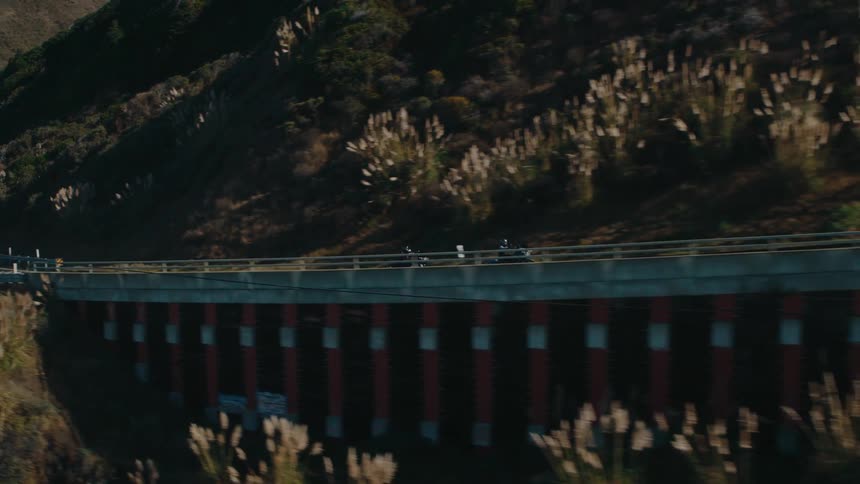 A footage of bikes moving on a freeway