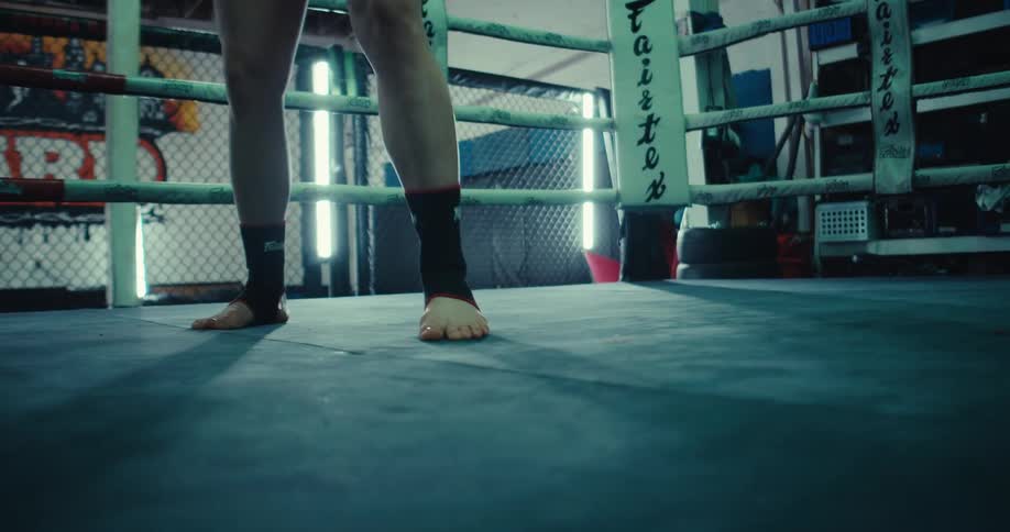 A footage of a person training in a boxing ring
