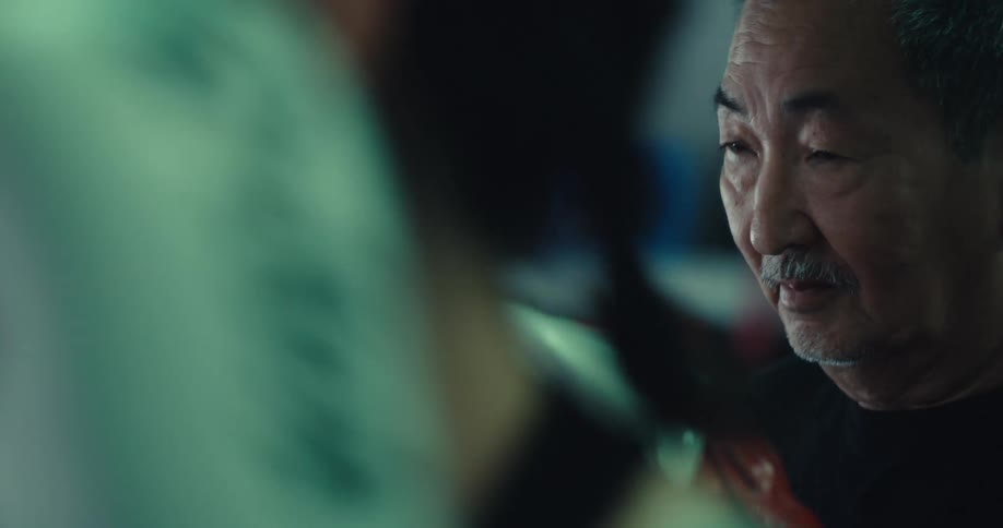 A footage of an asian man boxing