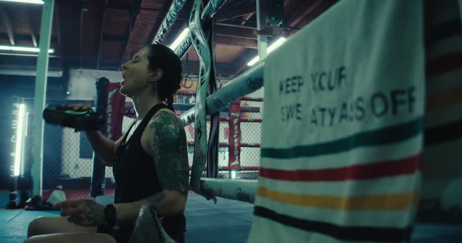 A footage of a lady dehydrating in the gym