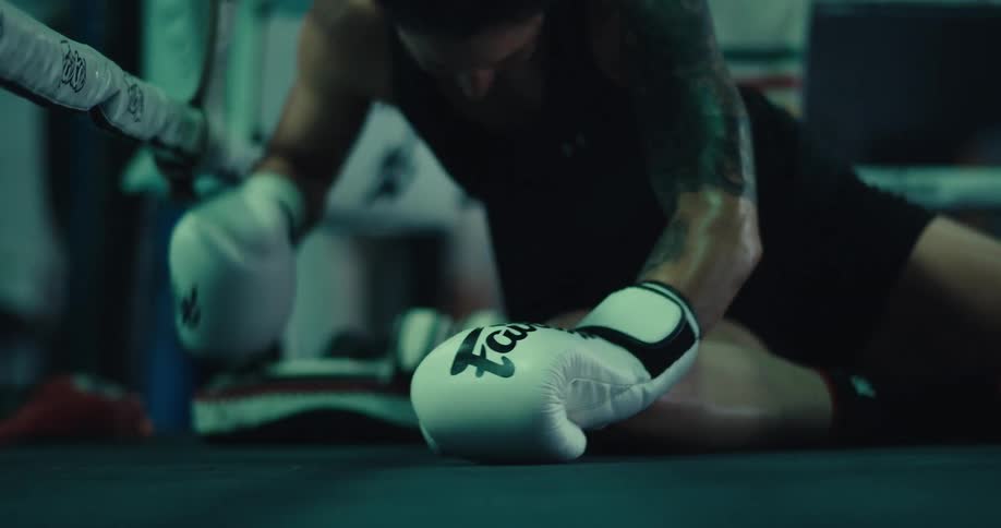 A footage of a female boxer falling down