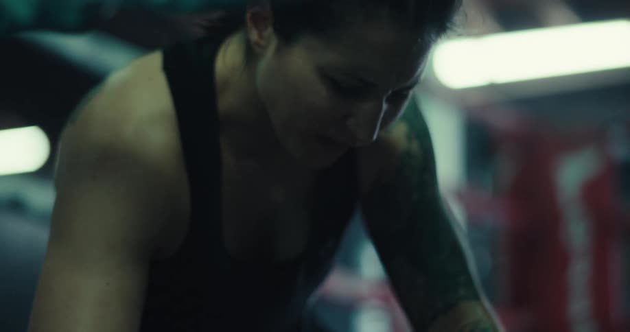A footage of a lady punching the floor aggressive