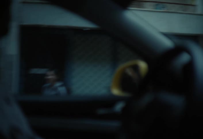A footage of a person in a car