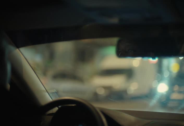 A footage of a man driving
