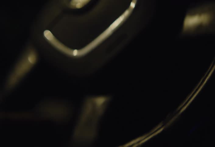 The steering wheel is turned back and forth