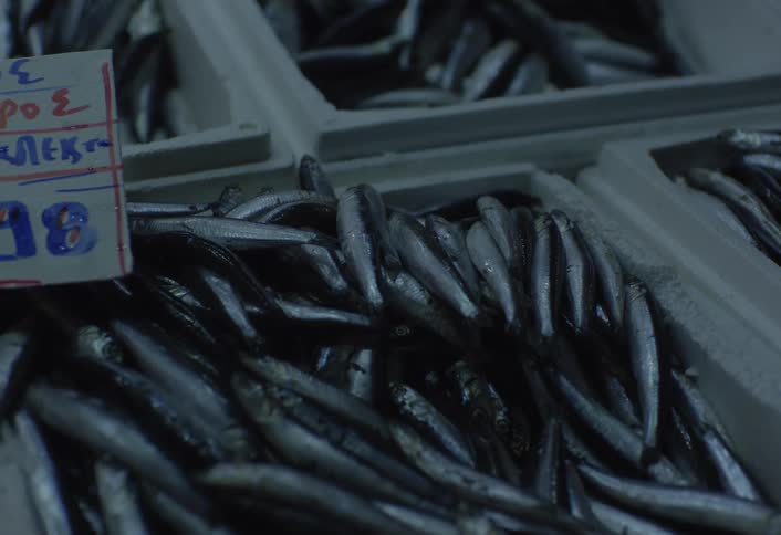 The market has stacks of fish for sale