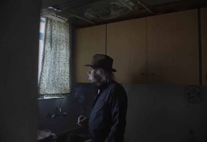An old man smoking