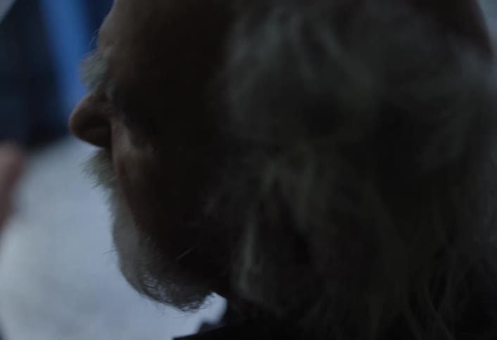 A man is talking with someone