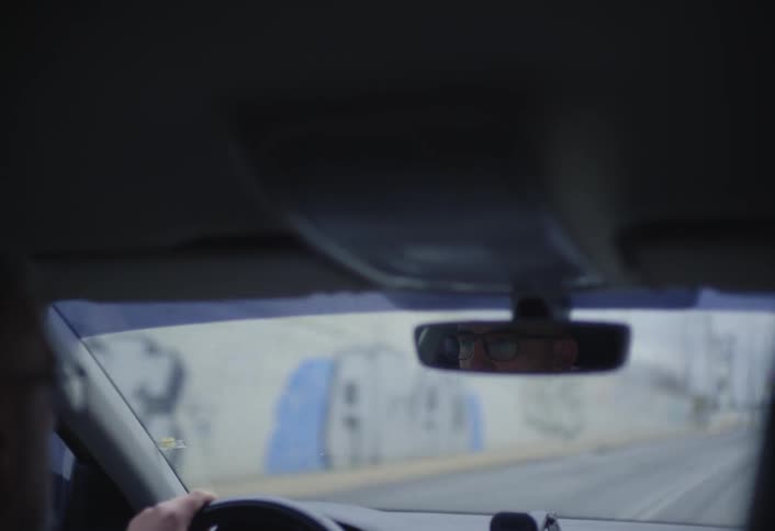 A drives out of the tunnel into traffic